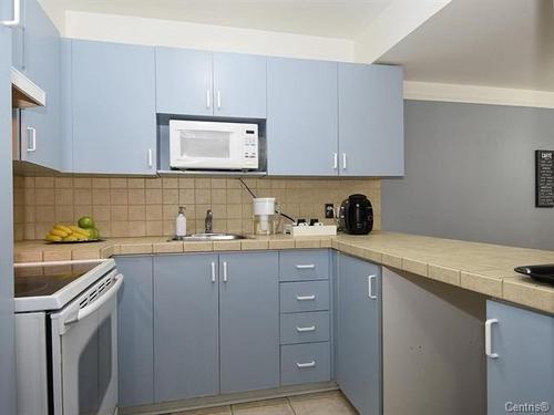 2 bedrooms apartment for rent in Laval — photo 10