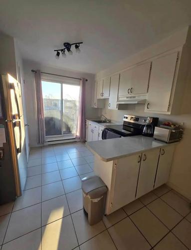 2 bedrooms apartment for rent in Laval — photo 2