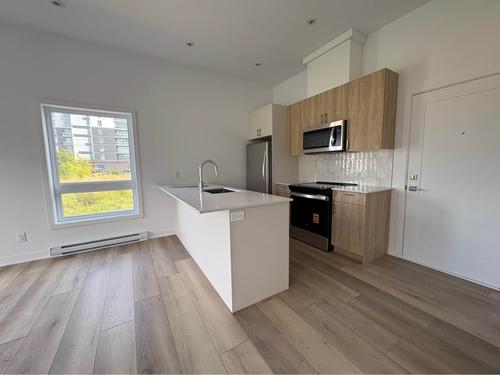 2 bedrooms apartment for rent in Laval — photo 10